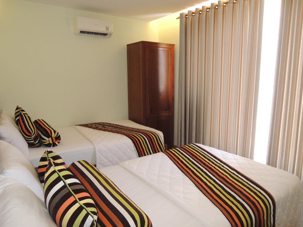 Art Deluxe Hotel Nha Trang Quarto foto